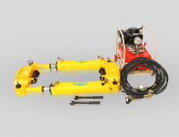 Hydraulic rail tensor for track maintenance