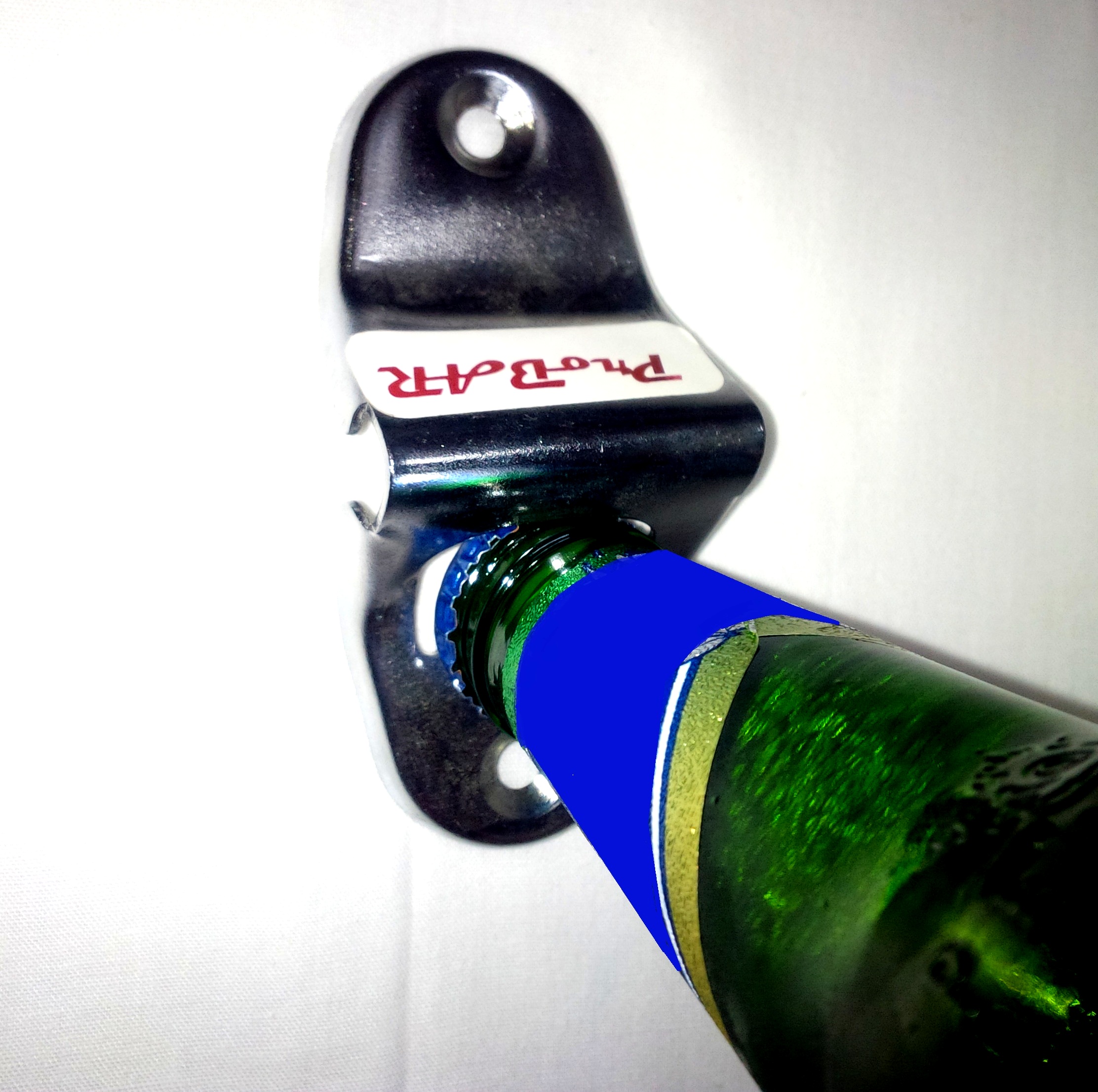 Wall mounted bottle cap opener